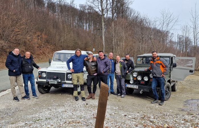 A group of off-road enthusiasts exploring the rugged terrain of Medvednica Nature Park in Croatia with their Land Rover Defenders.